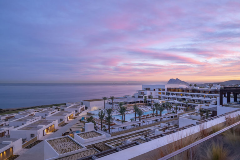 Swimming pool and sunset Fairmont La Hacienda Hotel , La Alcaidesa, Andalucia. Spain